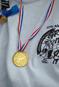 close up of "i am a winner" gold medal