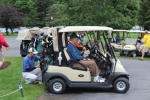 golfer in cart