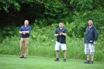 guys laughing on the tee box