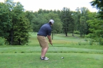 golfer lining up his shot