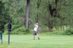 shot of a golfer teeing off in his backswing