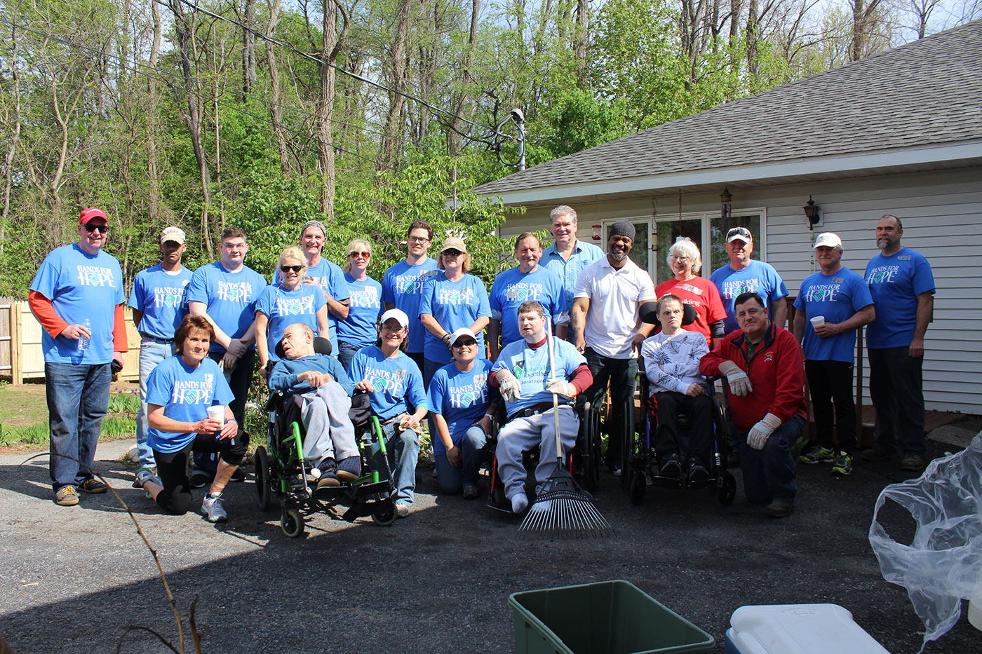Members pose for group photo after spring clean-up