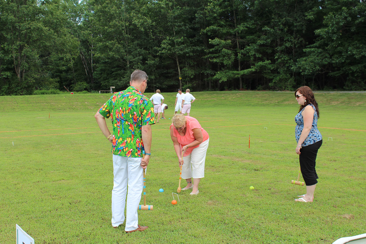 People playing croquet at AIM Services Croquet on the Green event