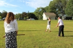 three people on the croquet field