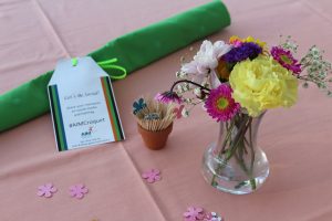 personal table setting with pretty flowers in vase