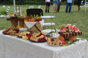 cheese fruit and wine table set up by catering