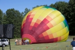 hot air balloon filling up on field