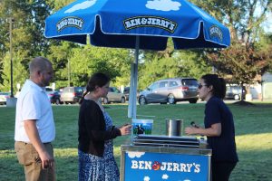 two people ordering from the ben and jerry's cart