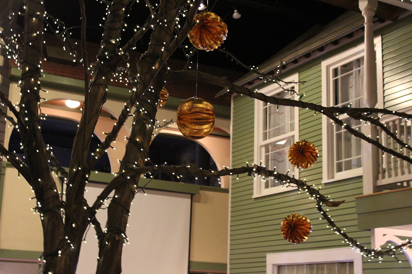 close up on a tree and decorative paper balls