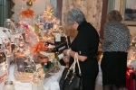 woman perusing the raffle table