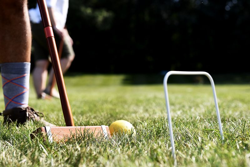 Close up of croquet mallet and ball at Croquet on the Green