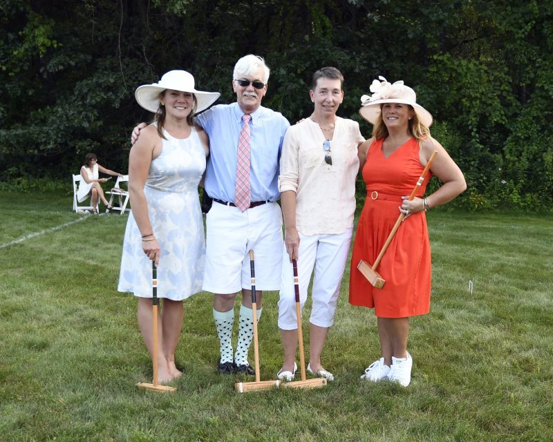 Croquet players on the Green with clubs
