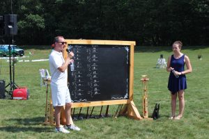 man and woman going over the croquet tournament match ups