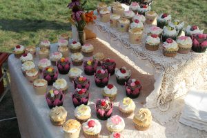 catering table with pretty cupcakes