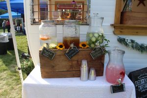 drink stand with ice tea, lemonade and other waters