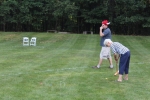 Croquet on the Green players. Man in viking hat