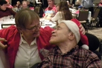 Executive Director June MacClelland with an individual supported, smiling and looking at each other