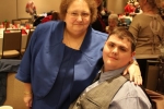 Mother and son at the Holiday Tea event