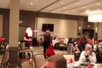 Santa entering the room at the Holiday Tea party