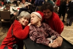 Three people at the Holiday Tea event