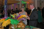 Couple at buffet at Mardi Gras for AIM Services