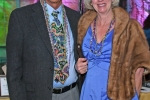Couple with beads at Mardi Gras event for AIM Services