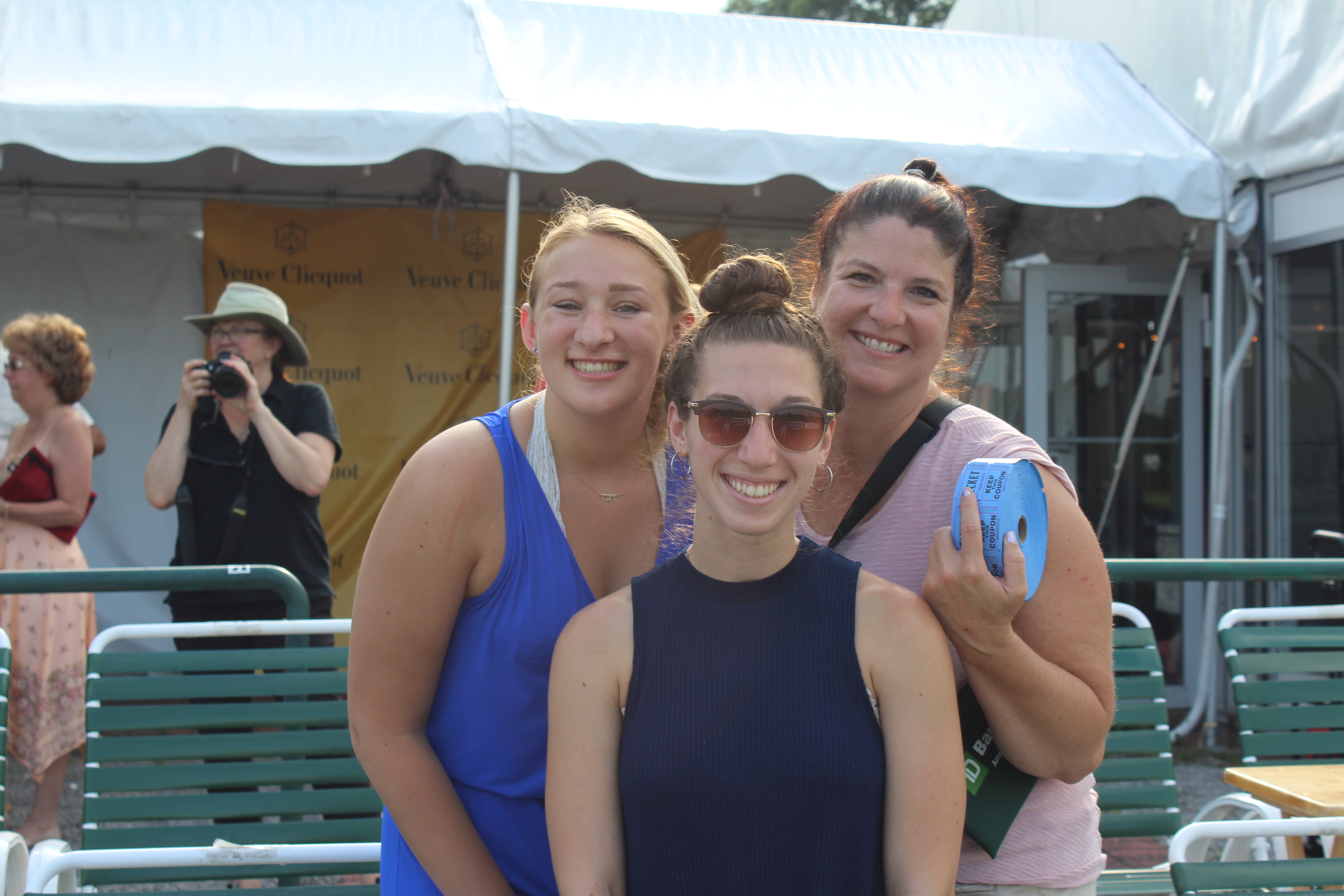 Group of three woman volunteering at the Saratoga Dog & Pony Show to benefit AIM Services, Inc.