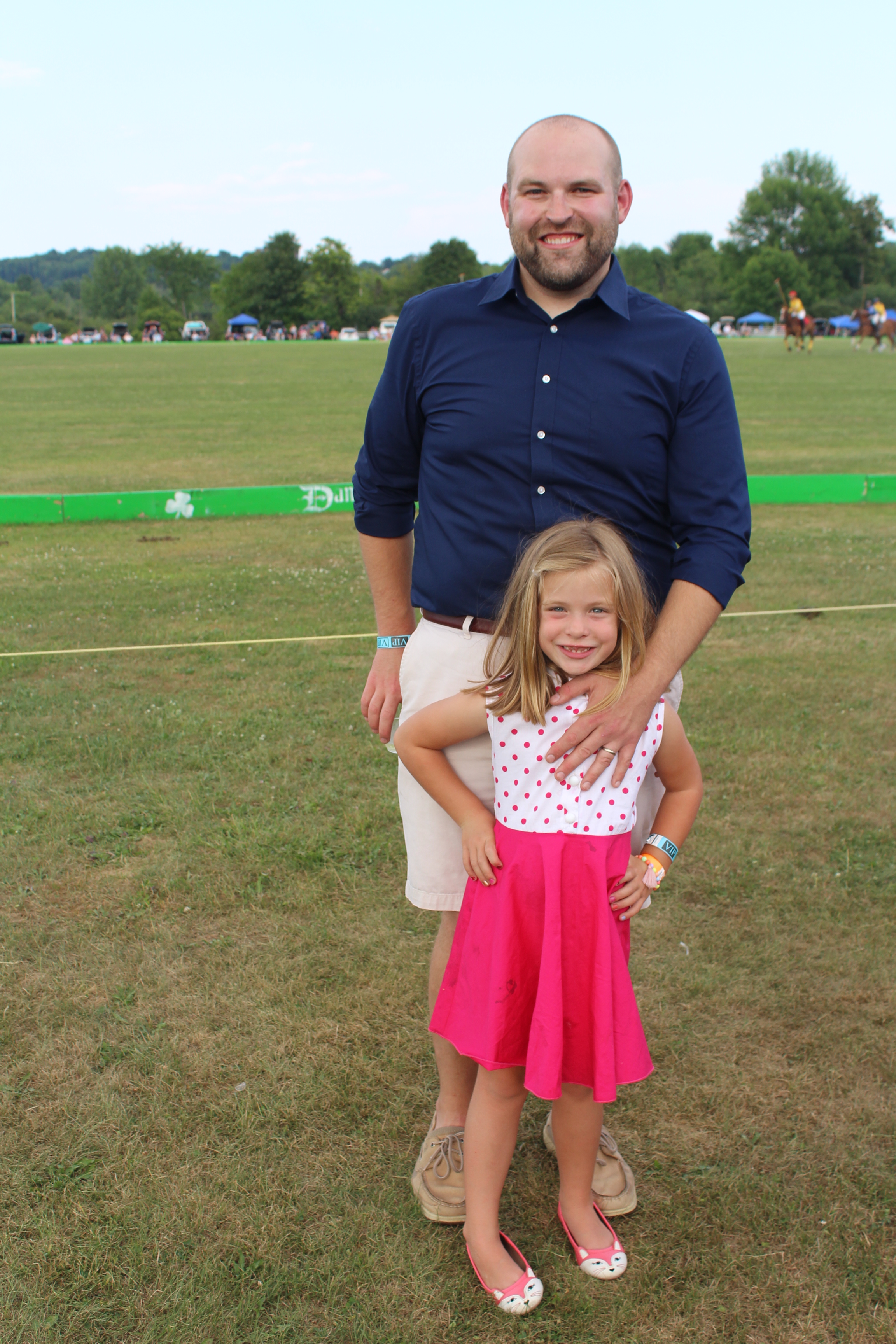 Josh Phelps with daughter at the Saratoga Dog & Pony Show to benefit AIM Services, Inc.