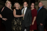Vin Le Soir to benefit AIM Services, Inc. group of five people at event