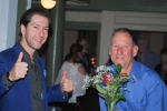 Vin Le Soir to benefit AIM Services, Inc. two men at event, one giving thumbs up
