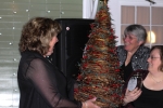 Vin Le Soir to benefit AIM Services, Inc. woman with grapevine christmas tree raffle item