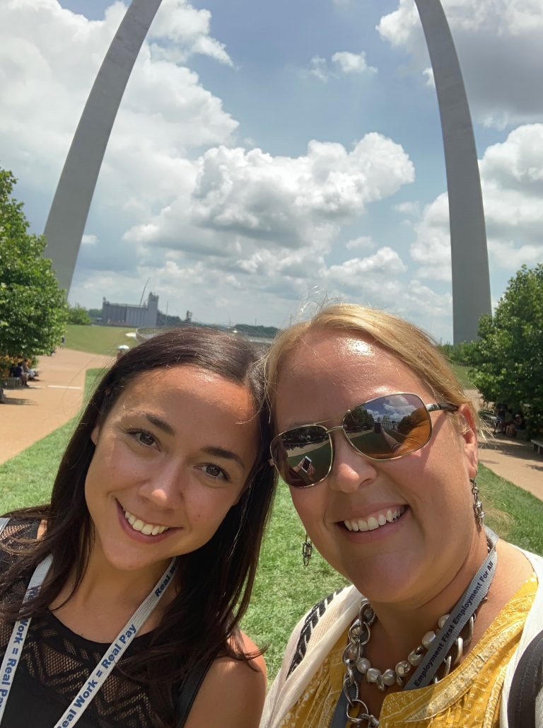 Katie Page and friend in front of Gateway Arch