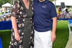Elizabeth "BJ" Lent and Josh Phelps standing together and smiling at Croquet on the Green 2019