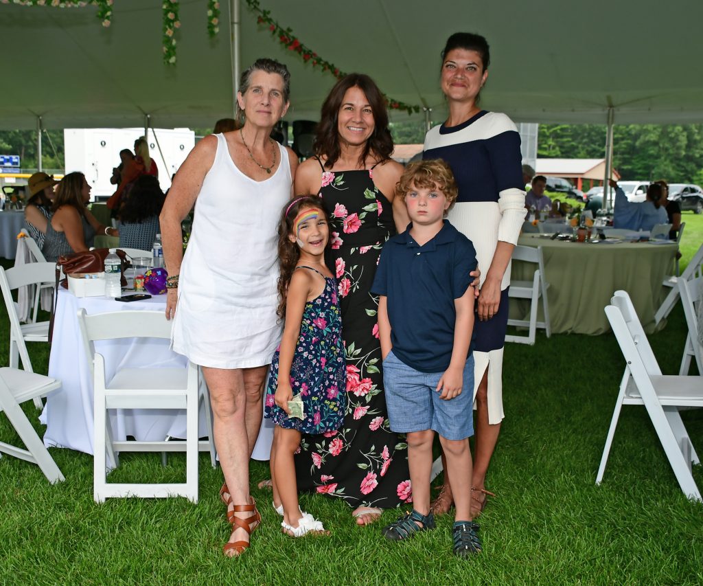 Group of three adults and two children at Croquet on the Green 2019