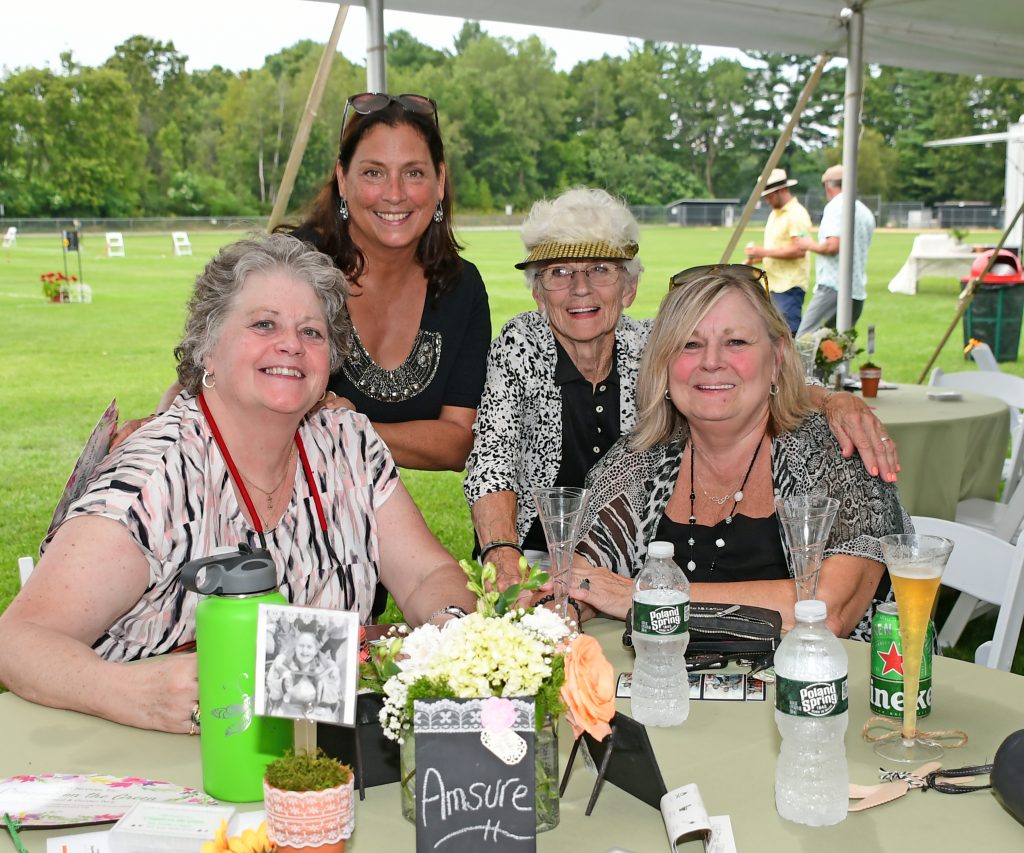 Group of four women at a table at Croquet on the Green 2019