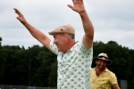 Man throwing his hands in the air with excitement at Croquet on the Green 2019
