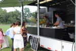Deliciously Different catering truck serving attendees at Croquet on the Green 2019