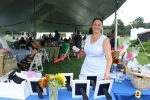 Tara Pleat in front of raffle at Croquet on the Green 2019