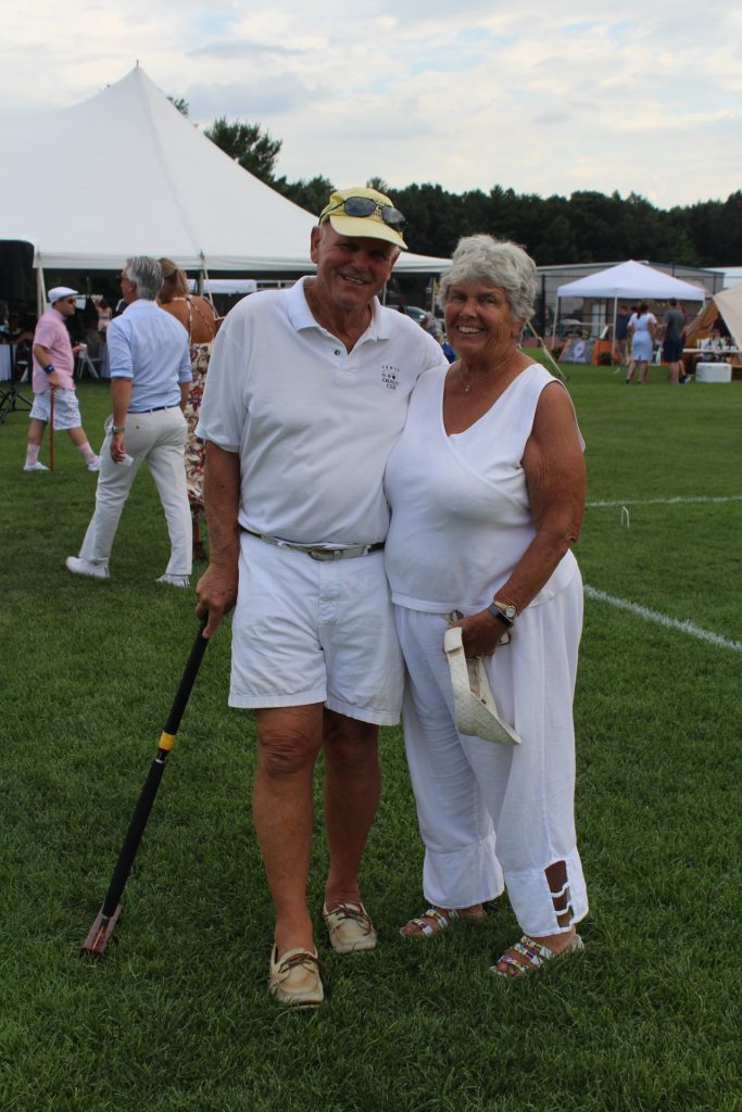 Couple in all white outfits at Croquet on the Green 2019