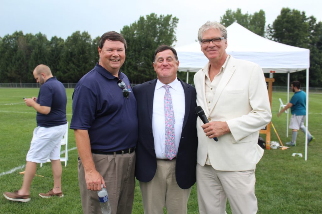 L-R: AIM Board President Brian Gwynn, Executive Director Chris Lyons, and Director of Public Relations Walt Adams together and smiling at Croquet on the Green 2019