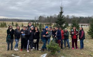 Group of people at a tree farm