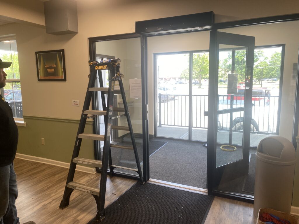 door entrance with ladder next to it